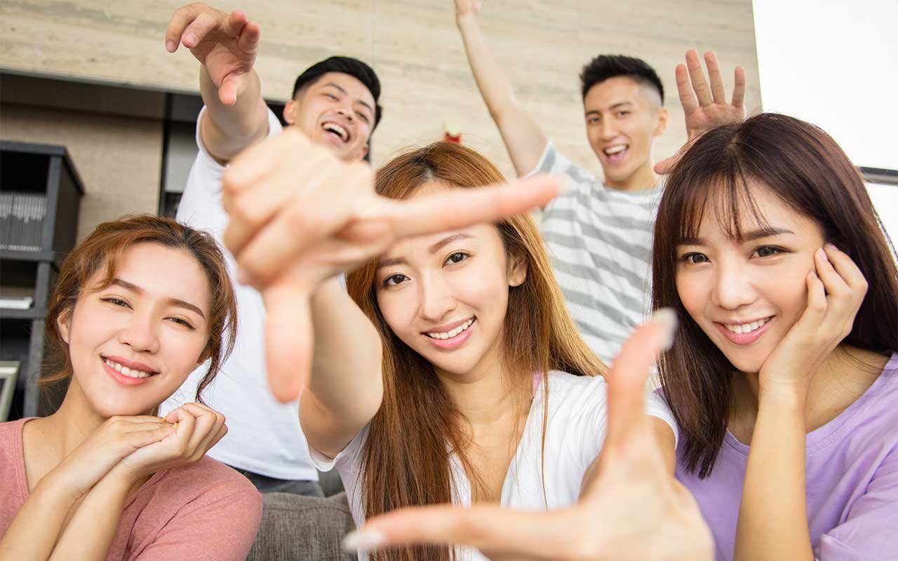 happy chinese students learning english