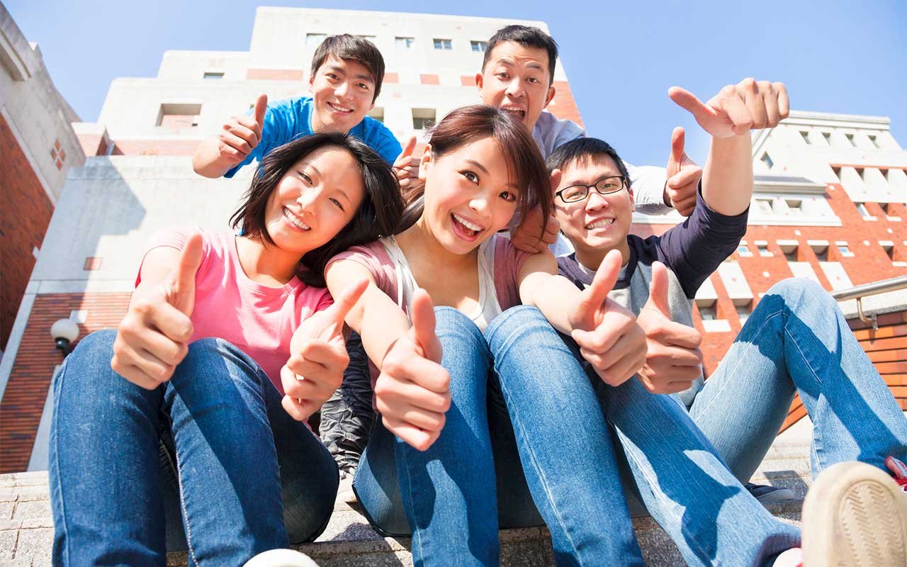 happy chinese students learning english