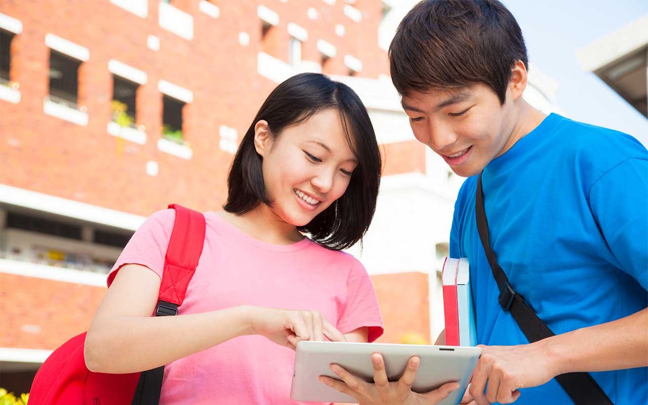 happy chinese students learning english