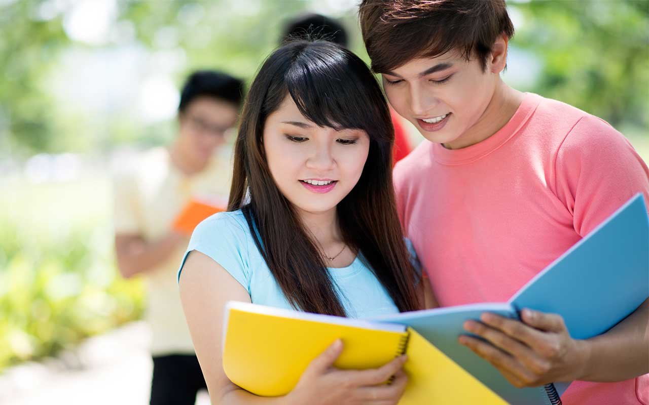 happy chinese students learning english