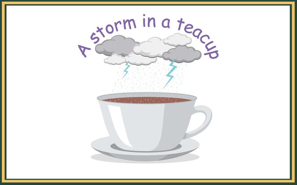 a cup of tea with a stormy cloud above to represent the idiom storm in a tea cup