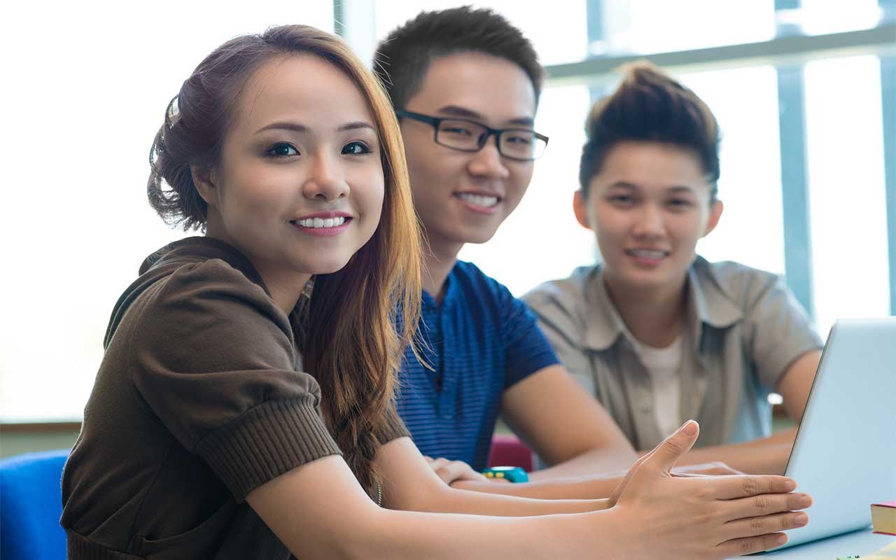 happy chinese students learning english