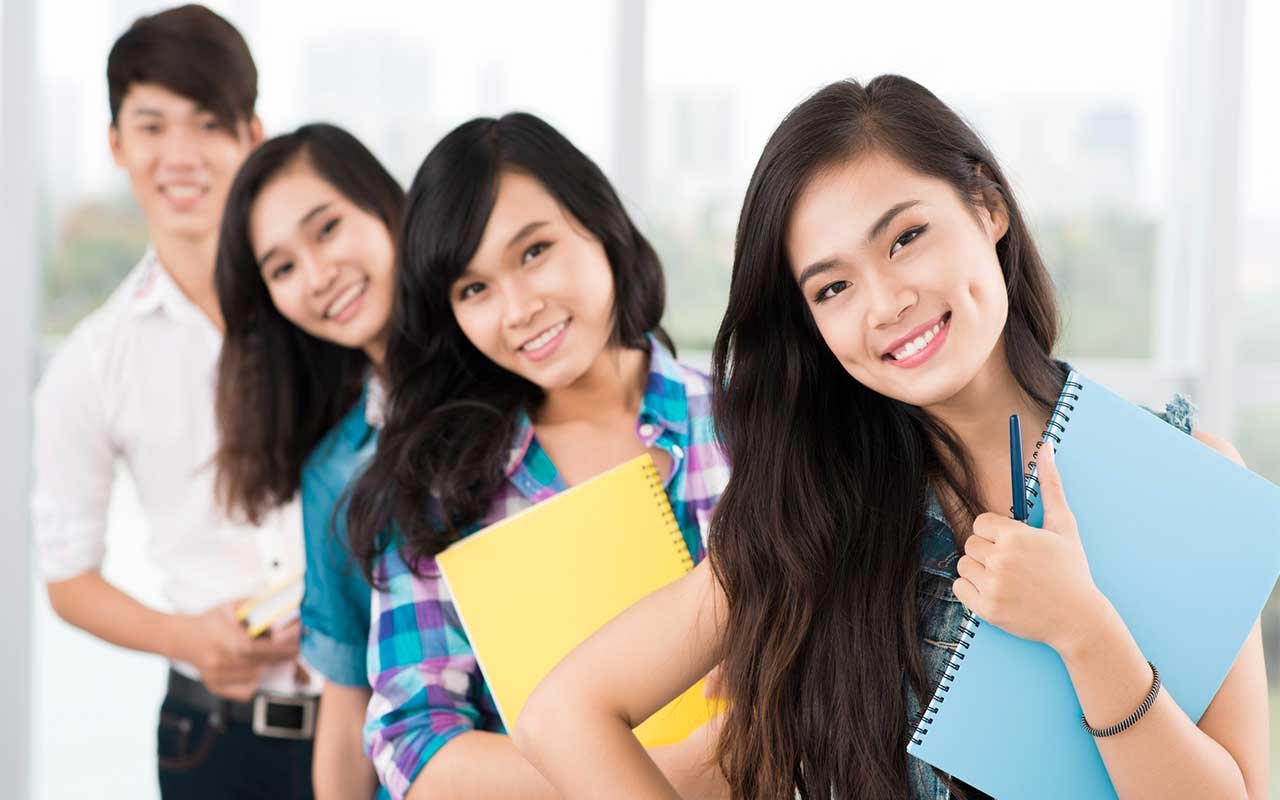 happy chinese students learning english
