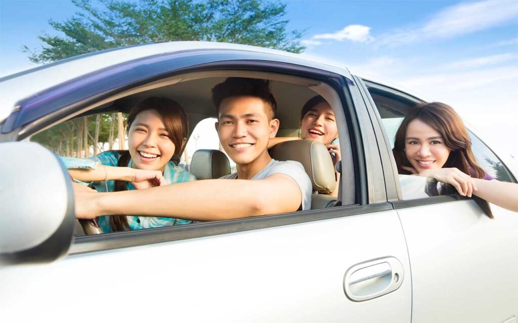 happy students enjoying car travel